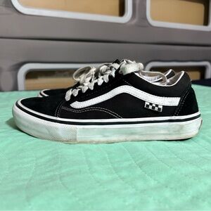 Vans men’s Black and White Sneakers
